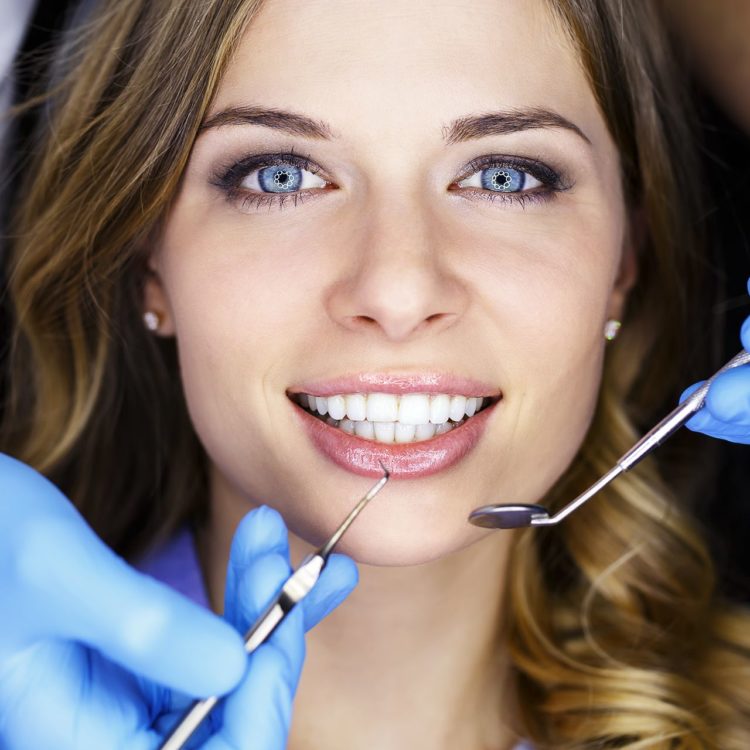 woman receiving a dental examination